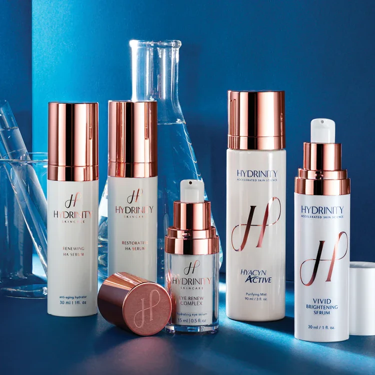 variety of Hydrinity skin care products on a blue background
